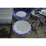 A quantity of blue and white glazed plates