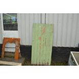 A green painted door