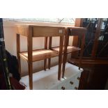 A pair of teak bedside tables fitted single drawer