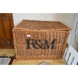 A wicker storage box and contents