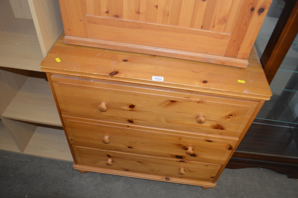 A modern pine chest fitted three drawers