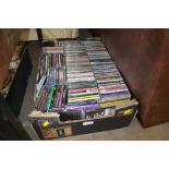 A box of various CD's
