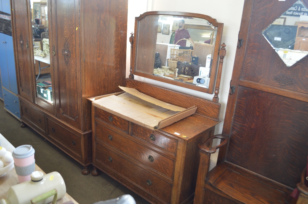 An oak dressing chest fitted two short over two lo