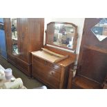 An oak dressing chest fitted two short over two lo