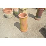 A terracotta chimney pot