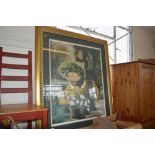 A large gilt framed print
