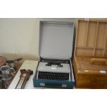 An Olivetti Dora typewriter in fitted case