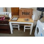 A modern pine dining table with a set of four slat