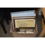 A box containing various photos, pictures and prin