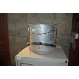 A galvanised mop bucket