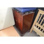 A reproduction mahogany TV cabinet