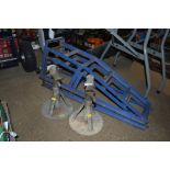 A pair of car ramps and axle stands