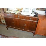 A reproduction mahogany side board fitted drawers