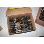 A box of assorted coils, condensers, Bakelite tran