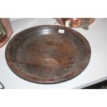 A antique elm shallow bowl, 46cm dia.