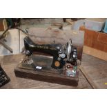 A Singer hand sewing machine