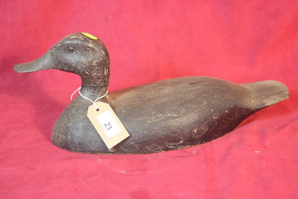 A wooden decoy duck, 40cm long