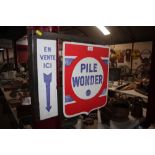 A "Pile Wonder" double sided enamel advertising sign