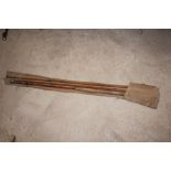 A four section cane fishing rod and carrying bag