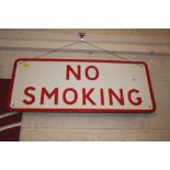 A metal "No Smoking" sign 25.5cm x 60cm