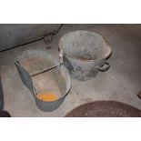 An old galvanised feed bin and a galvanised hand