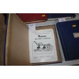 A folder containing early Ransomes priced parts li