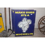 A pair of "Michelin" advertising signs 82cm x 61cm