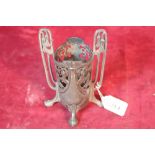 An Art Nouveau pewter bottle holder, probably WMF,