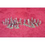 A collection of Zinnfiguren type flat painted model soldiers to include