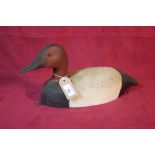 A carved decoy duck modelled by Tom Martingdale, 3