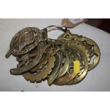 A bundle of miscellaneous horse brasses