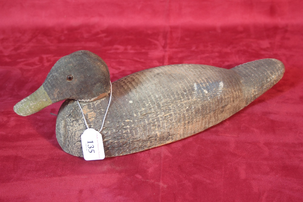 A wooden decoy duck, 40cm long