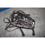 Four pairs of riding reins