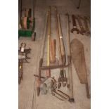 A quantity of vintage gardening tools, including o