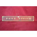 A painted wooden "Post Office" sign, 91cm long