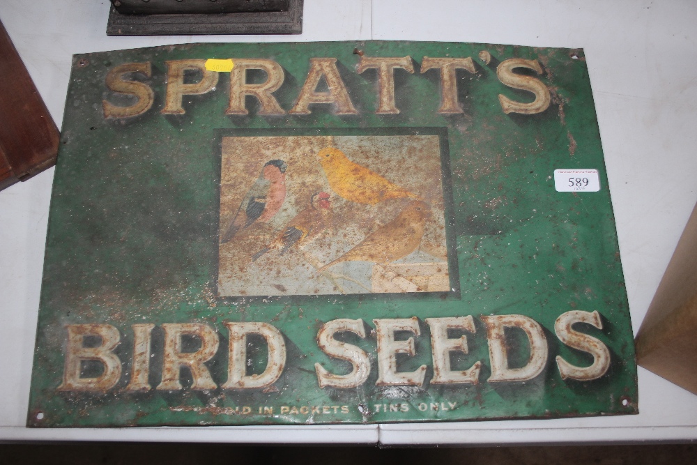 An embossed "Spratt's Bird Seeds" tin advertising si