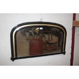 A Victorian ebonised and gilt arched overmantle m