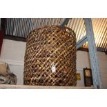 A large wicker log basket