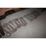 Approx. 60 old cast iron cemetery plot markers; an