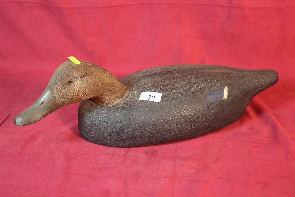 A wooden decoy duck, 53cm long