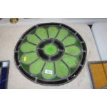 A stained glass and leaded circular panel, 42cm di