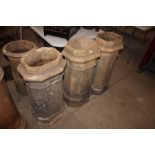 Three vintage shaped matching chimney pots