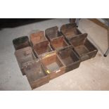 Eleven various wooden nail trays