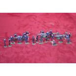 A collection of Zinnfiguren type flat painted model soldiers to include