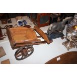 An antique toy horse and cart