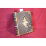 A Victorian leather and brass bound Family Bible