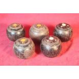 A set of five ladies bowling woods, initialled T.G.
