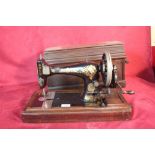 A Singer hand sewing machine No. P554119
