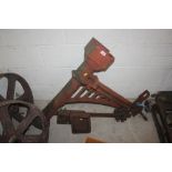 A vintage cast iron weighing machine
