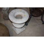 A marble baluster garden urn, 46cm high